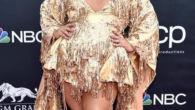 Why do women on music award shows or on other red carpet events have to compete with others to have the most daring outfits?