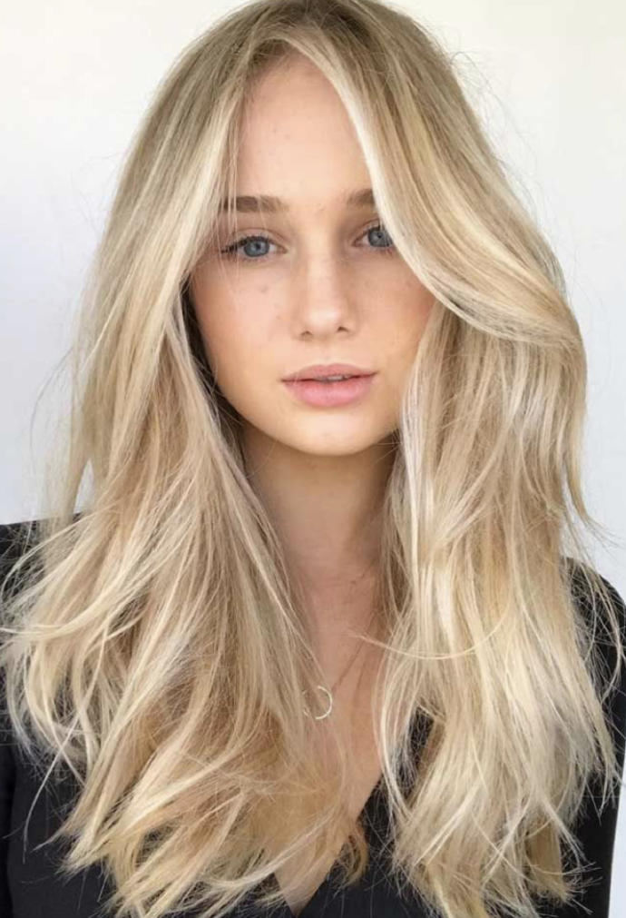 Which hair and eye color combo is most attractive out of these two?