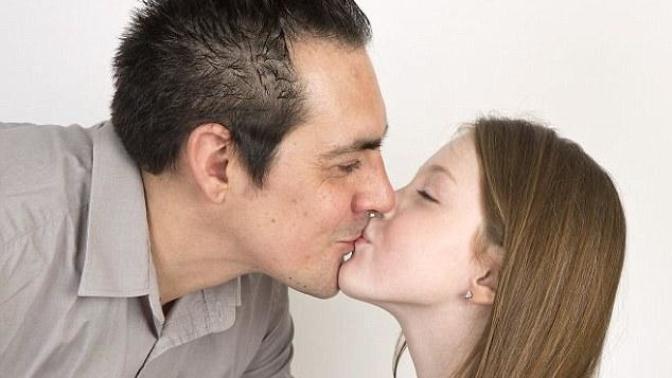 Girls, Daughter kissing her Father on the lips?