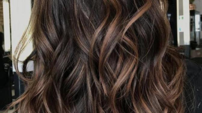 Should I colour my hair brown or keep it black?