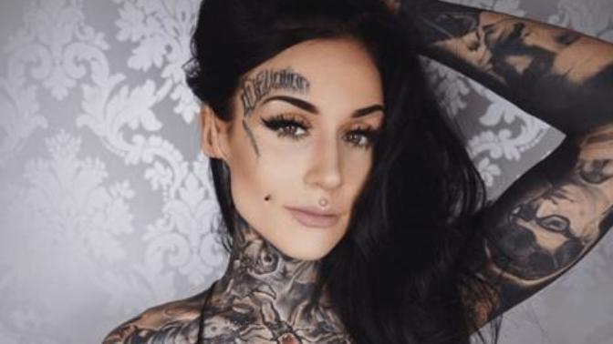 When a beautiful woman covers herself up with tattoos, is it the equivalent of putting bumper stickers all over a Ferrari?