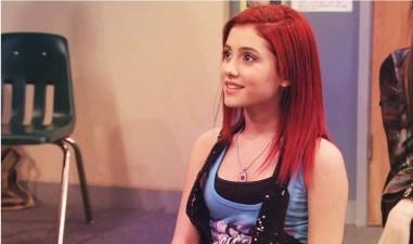 Is Ariana grande more hot or cute looking?