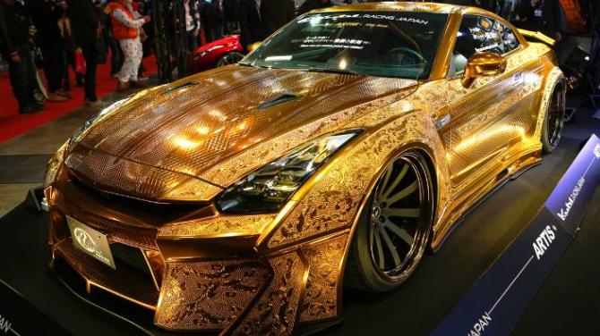 Gold Godzilla Nissan GT-R (intricately hand engraved by the companys art craftsman.)