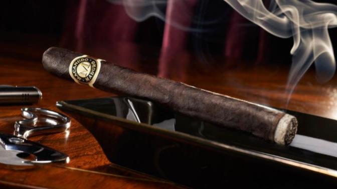 Is smoking cigars far less dangerous than smoking a regular cigarette?