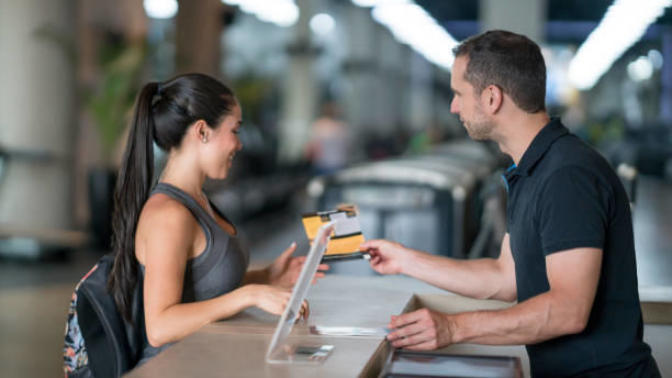 There is this girl who I fancy that works at the front reception desk of my recreational center. What are some ways I could approach her?