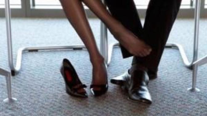 What does it mean if a female coworker asks a male coworker if there is anything she could do to make him feel better?