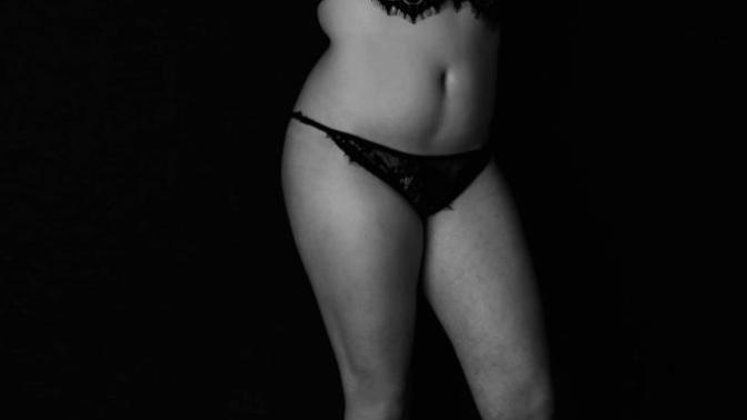 What is this line under my belly button? I don't see it on other people. It shows up on me in every picture I take?