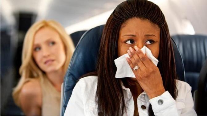 Should people be allowed to fly when sick?