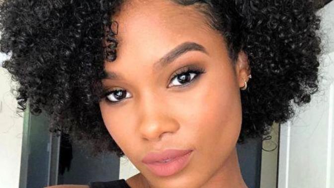 What do you think of women's natural black hair in this hairstyle?