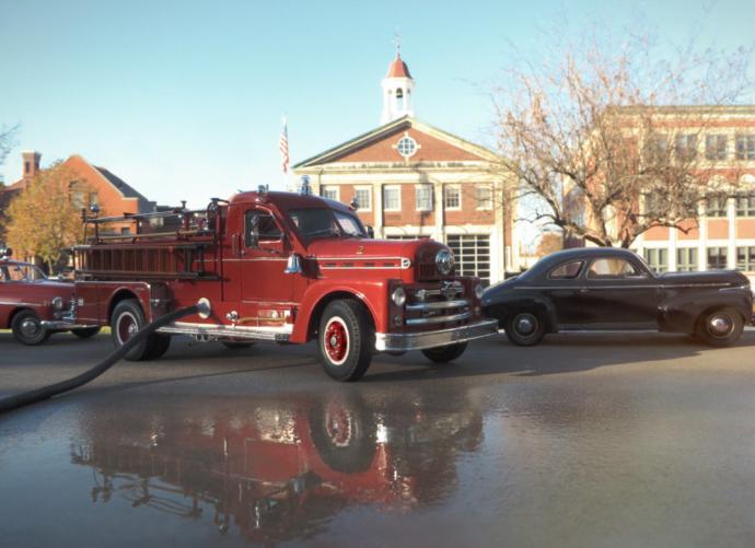 Which of these photos is the model car?