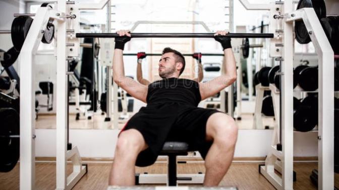 How do I appear more friendly in a gym?