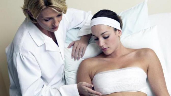 Guys, if your girlfriend wanted breast reduction surgery (and she qualified), would you support her decision?