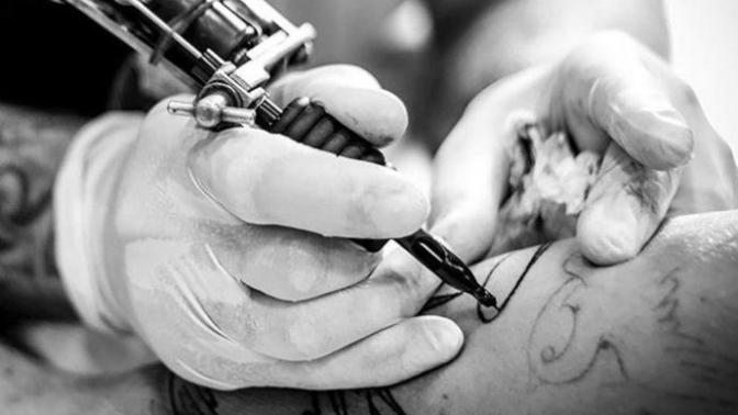 What are the pros and cons of getting a tattoo?