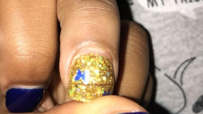 I broke my acrylic nail and it’s still attached?