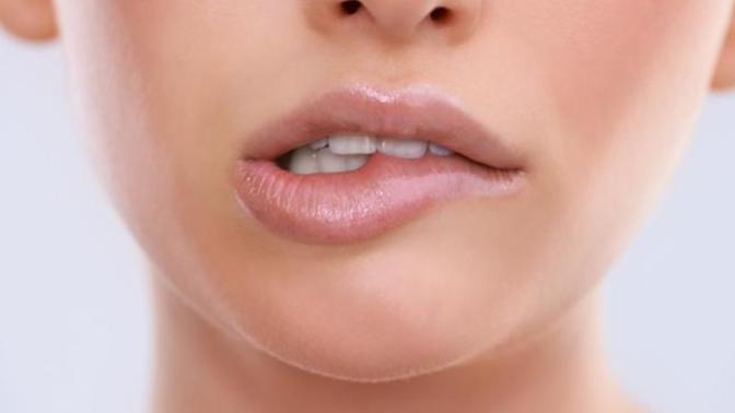 When someone lip-bites, what is your initial thought?
