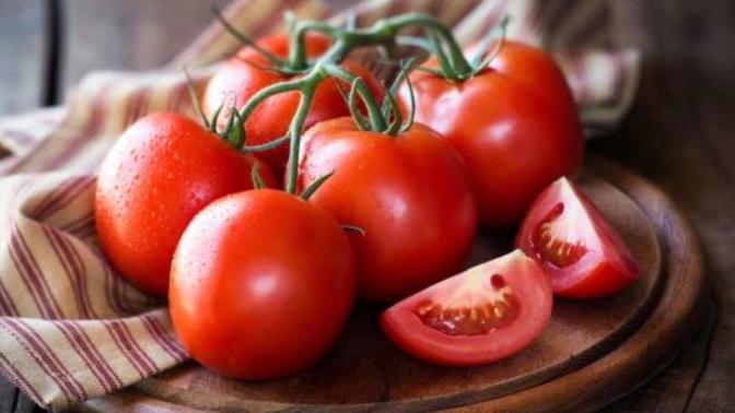 Which food group should tomatoes be classified as?