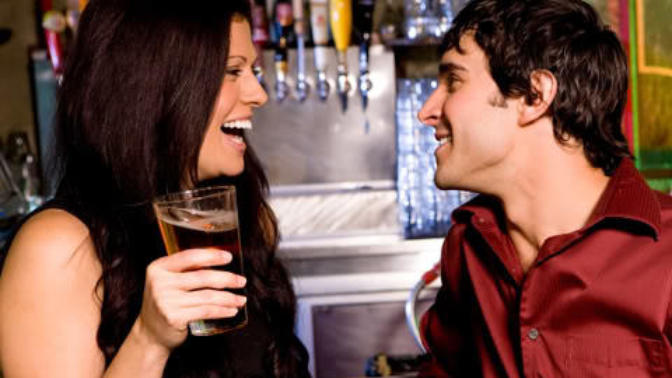 How do I build up courage to talk to women at the bar?