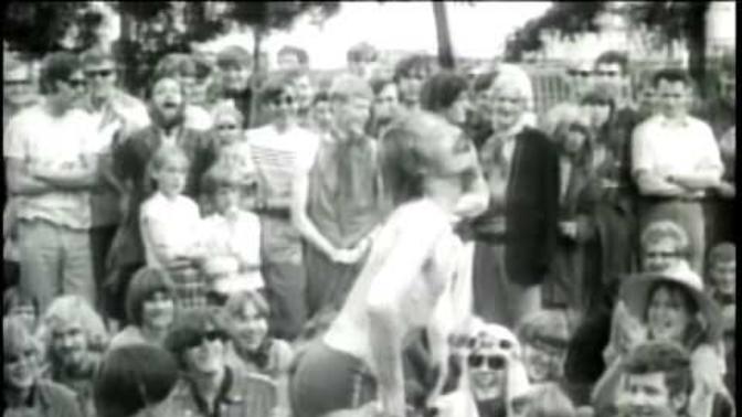 Do you think the 1969 song 'Time of the Season' by The Zombies is sexualized and does the woman wearing a cross necklace seem sacrilegious?