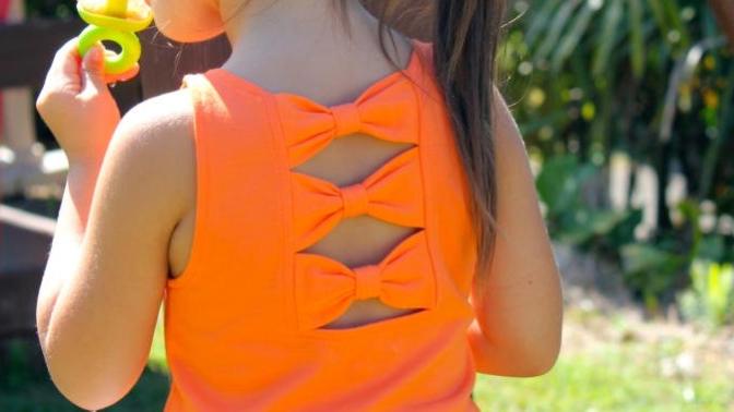 Girls, How old were you when you 1st wore a triple bowtie back shirt?