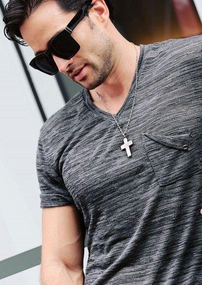 Have you ever worn a Christian cross necklace and was there an emblem of Jesus or His name displayed on it?