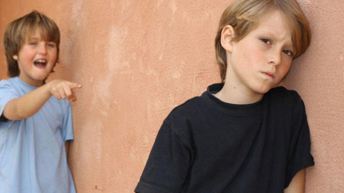 What would you do if your 12 year old son started skipping school due to bullies?