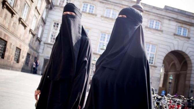 I live in a society where many women wear bruka and it makes me sad, accept it or move?