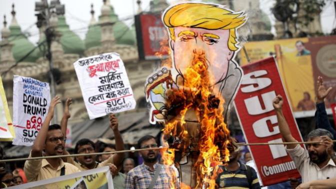 How is trumps trip to india being reported in america?