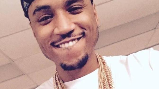 Why did he have his bottom lip in his mouth, smiling hard?