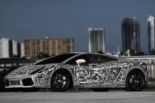 Which of these Hand engraved / Custom vehicles is your favorite?