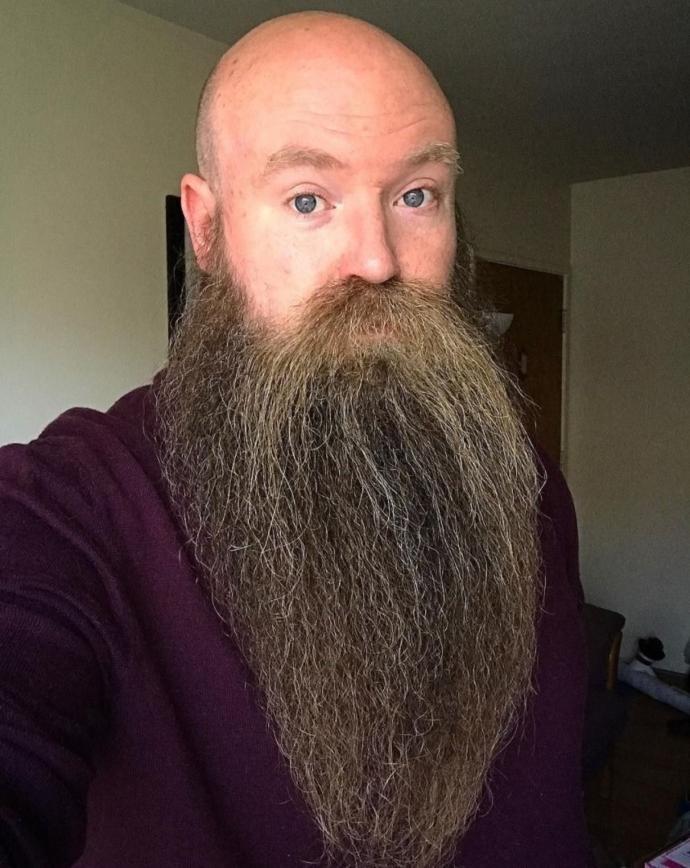 At which age, in years, were you able to start growing facial hair?