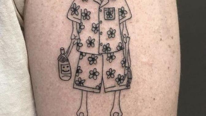 What would you do if your girlfriend returned home after clubbing with this tattoo?