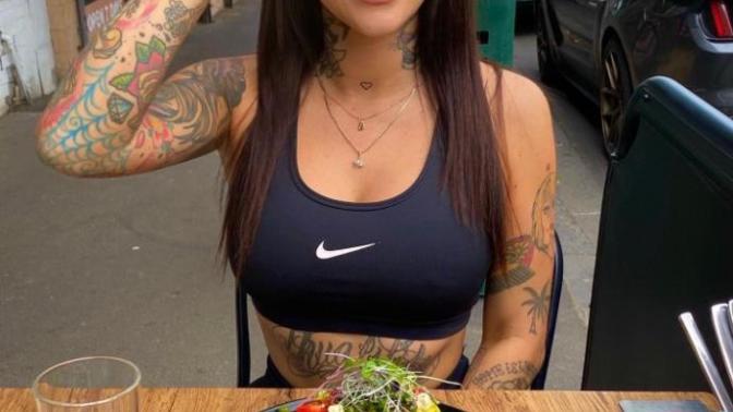 Guys, would you date a woman with tattoos?