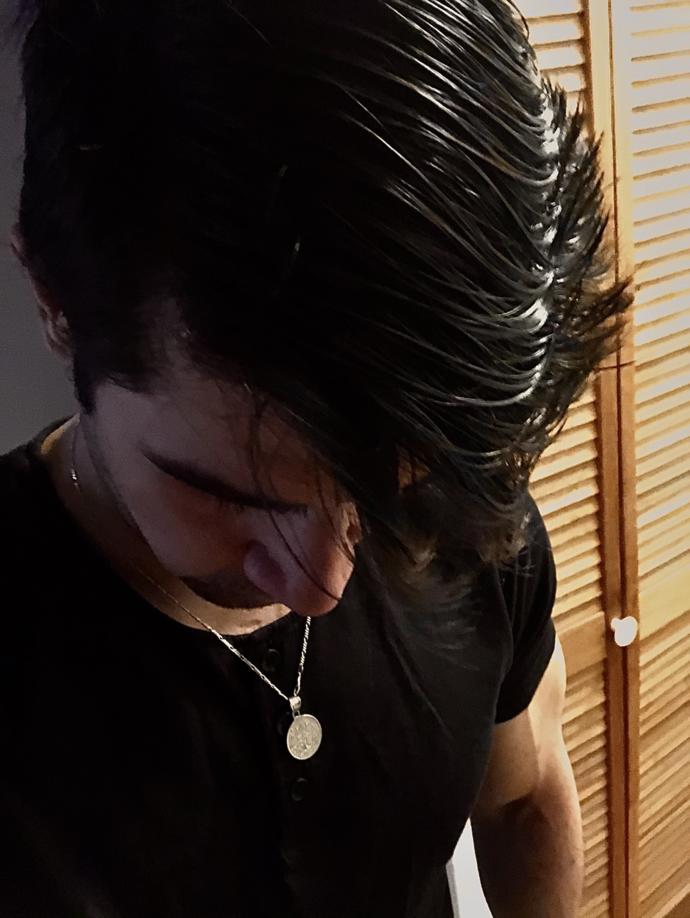 Are necklaces hot or flashy on a guy?