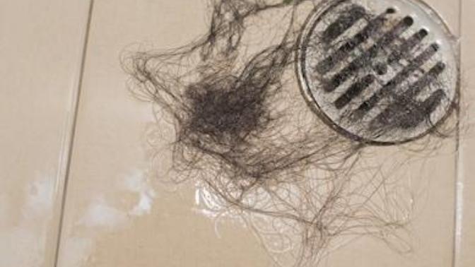 Hair shedding on the bathroom floor and clogged drains?