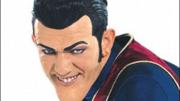 Why are smiles not threatening to humans?
