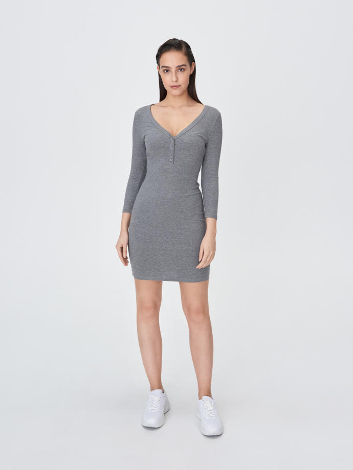 Which dress would look better on pale skin and white hair?