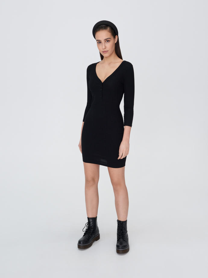 Which dress would look better on pale skin and white hair?