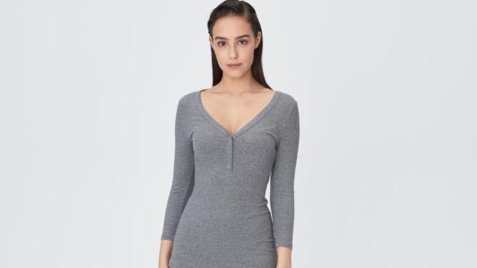 Which dress would look better on pale skin and white hair?