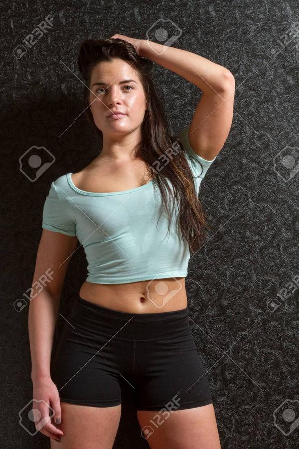 Does a light blue top with black shorts match on this woman?