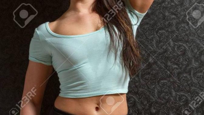 Does a light blue top with black shorts match on this woman?
