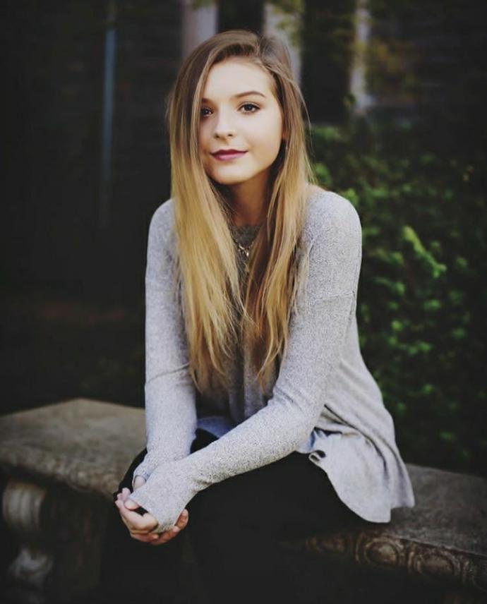 Which hair style does she look the most pretty in?
