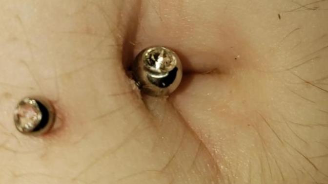 Is my navel piercing rejecting or migrating... had it for a month?
