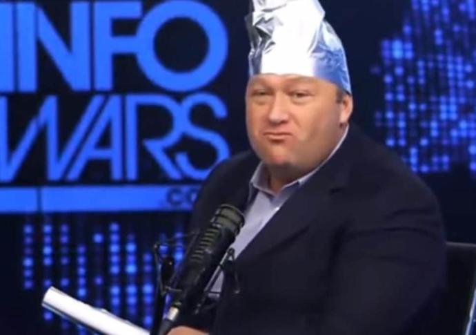 Alex Jones wearing a “tin foil” hat