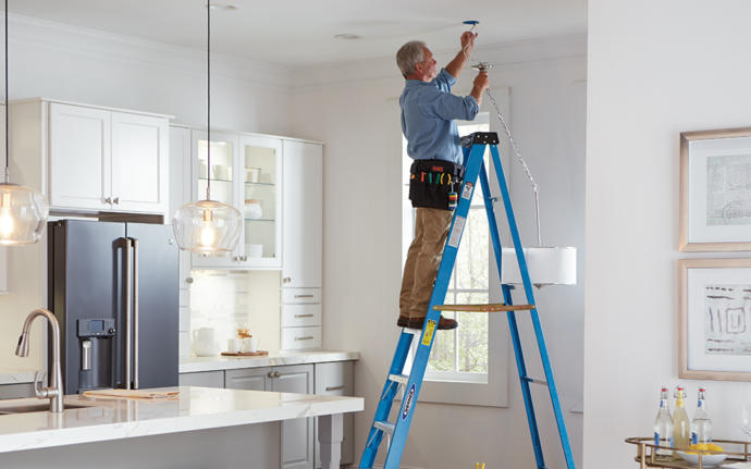 Do you stand on the top of ladders?