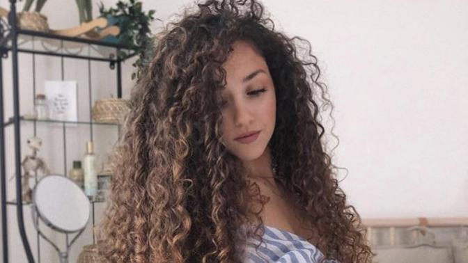 How long do you think it would take for my curly hair to grow that long?