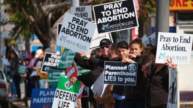 Why do many anti abortion and religious/conservative people hate on single mums but also shame on women for abortion?