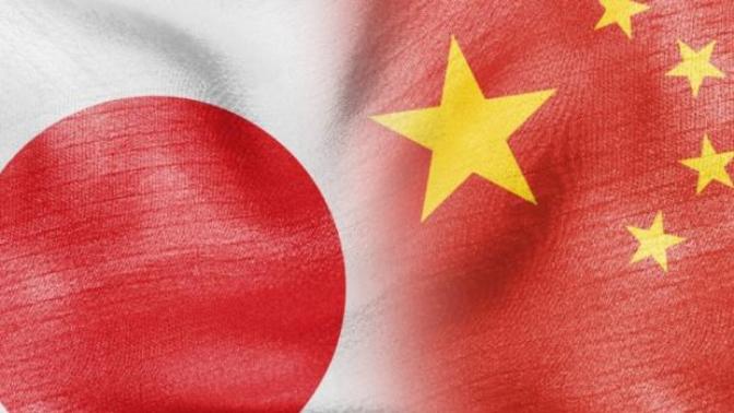 Is there a way to tell the difference between a Chinese person and a Japanese person just by looking?