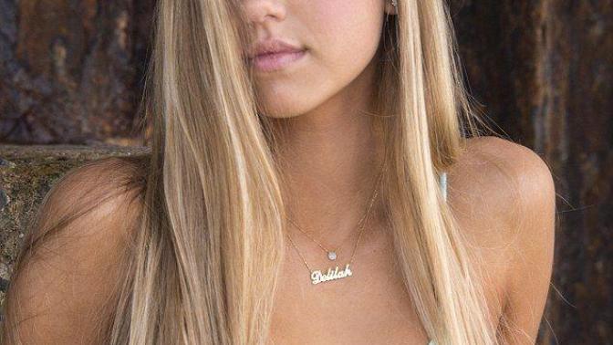 Which of these best indicates that Delilah Belle Hamlin is serious about her modelling?