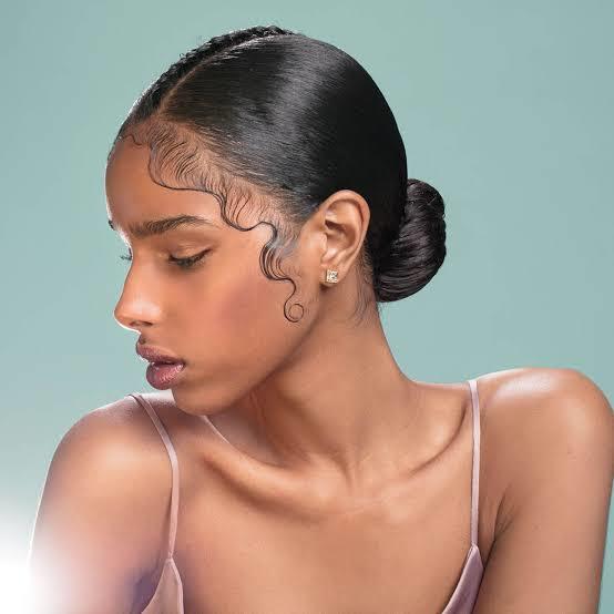 Is it racist/appropriation for a non-black person to lay their edges?