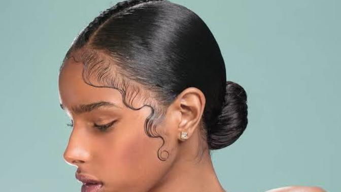 Is it racist/appropriation for a non-black person to lay their edges?